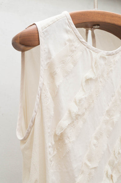 White Sleeveless Top